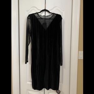 Black dress with mesh sleeves and v neck detail